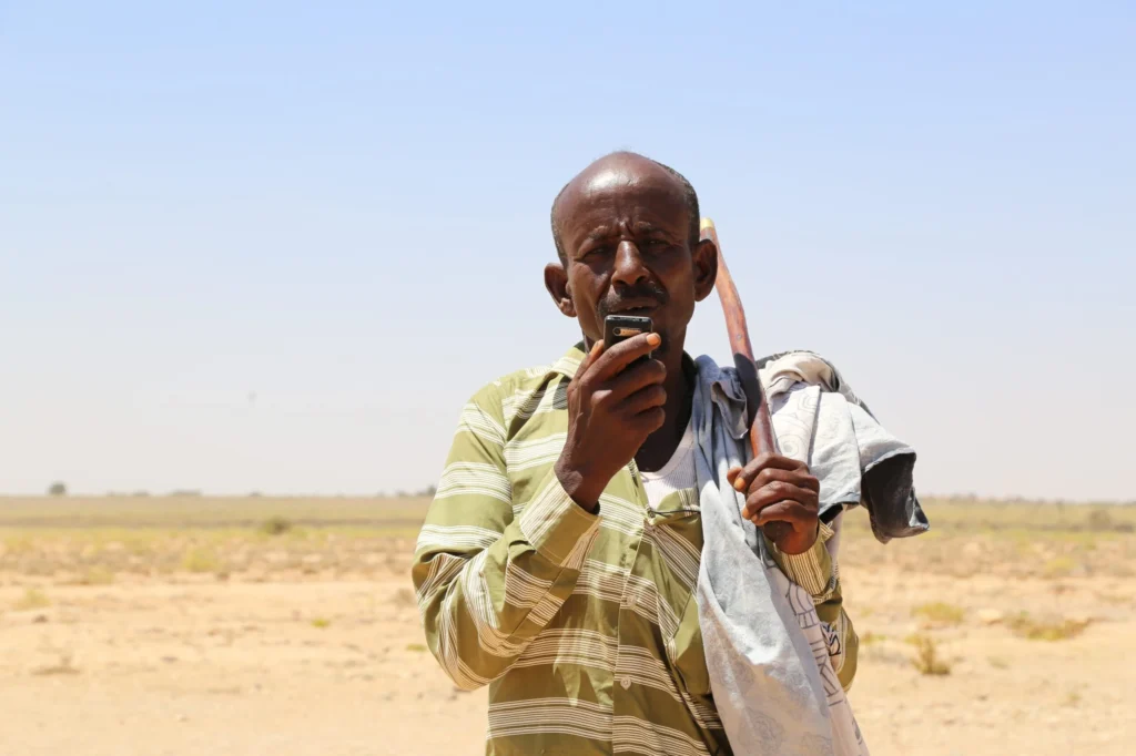 Somali Nomad Using Mobile Money